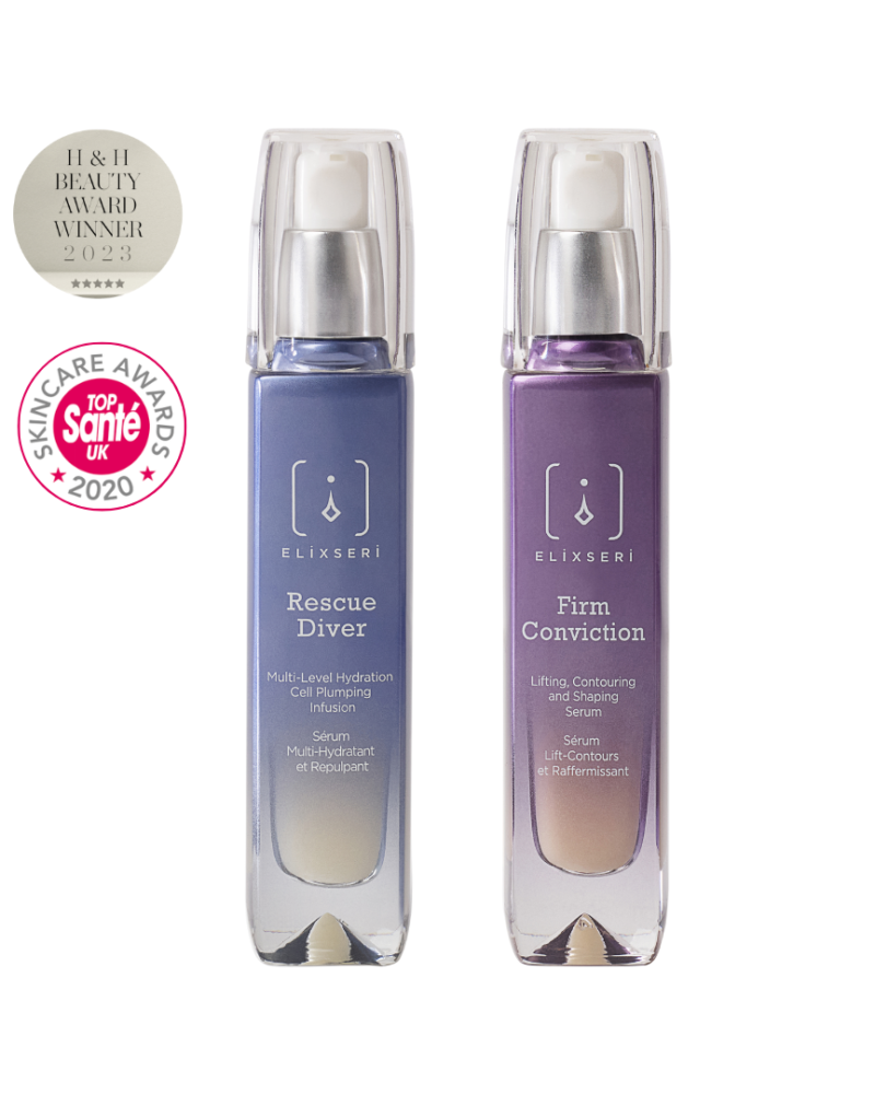 Elixseri Rescue Diver serum in a blue bottle next to Firm Conviction serum in a purple bottle with their award logos.