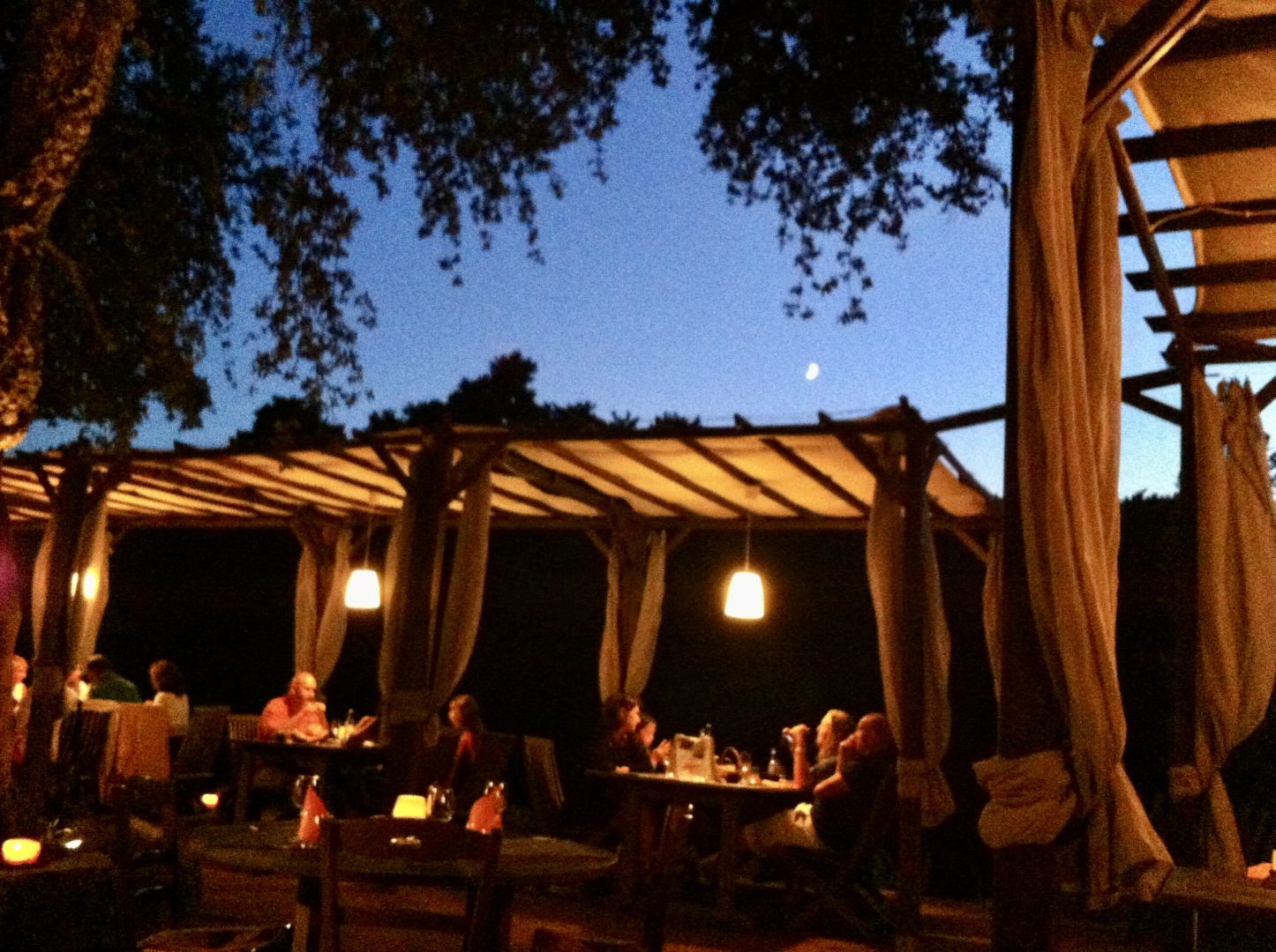 Evening outdoor dining at La Frere restaurant in Corsica