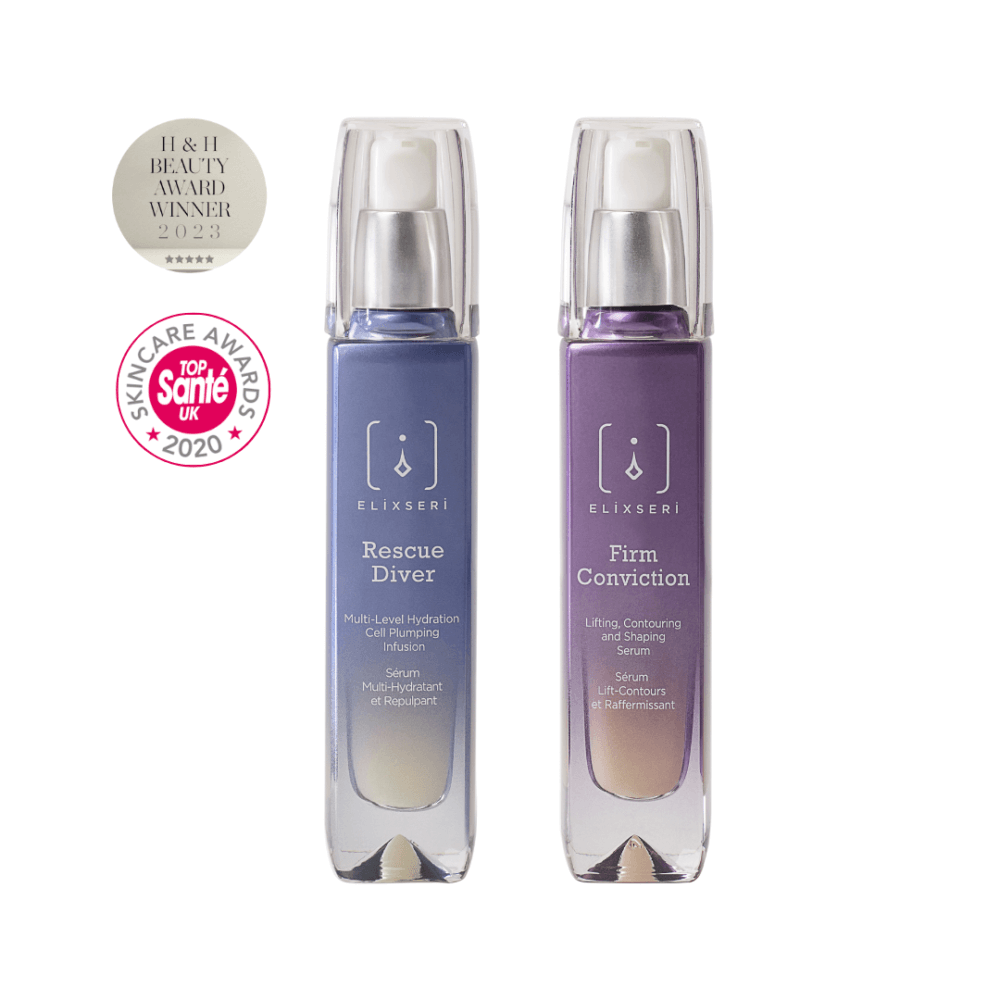 Elixseri Rescue Diver serum in a blue bottle next to Firm Conviction serum in a purple bottle with their award logos.